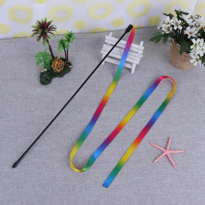 Supplier styled view of one complete wand and attached rainbow ribbon. Scene decorations are not included.